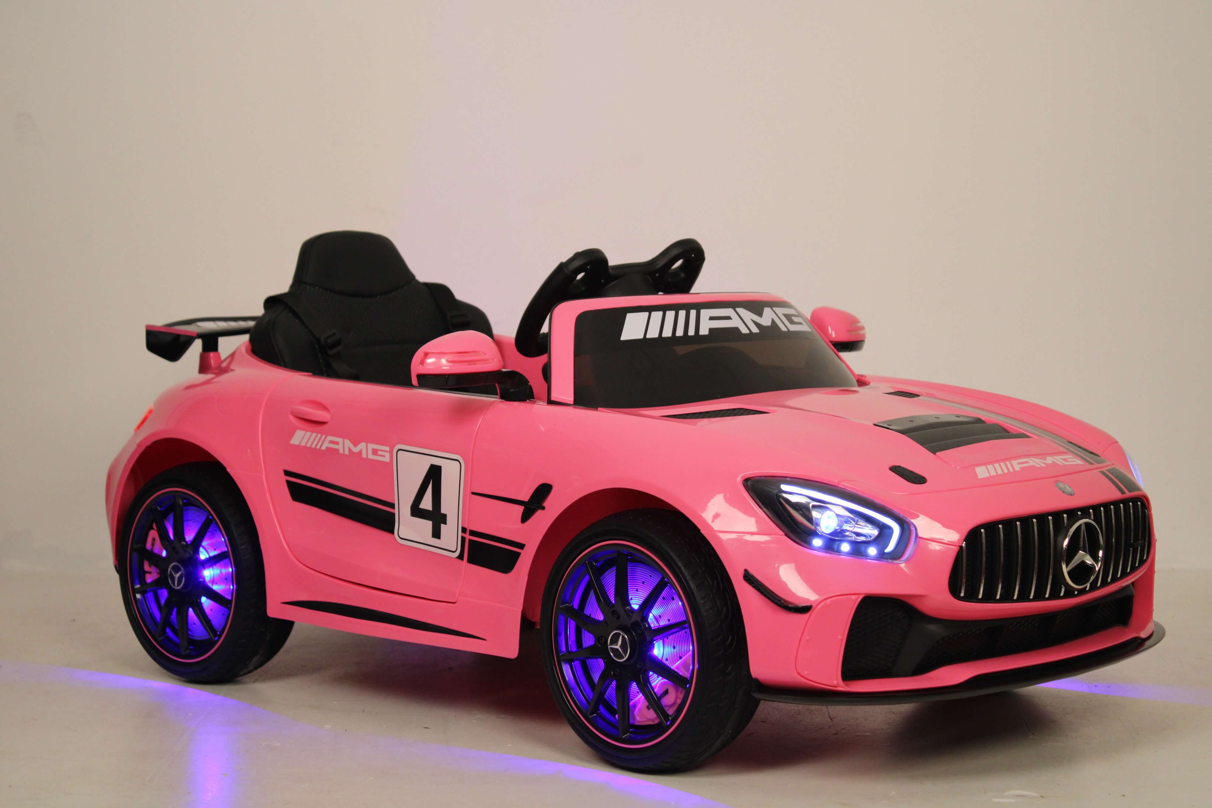 Электромобиль детский RiverToys Mercedes-Benz GT4 A007AA (лицензия) розового цвета Электромобиль детский RiverToys Mercedes-Benz GT4 A007AA (лицензия) розового цвета